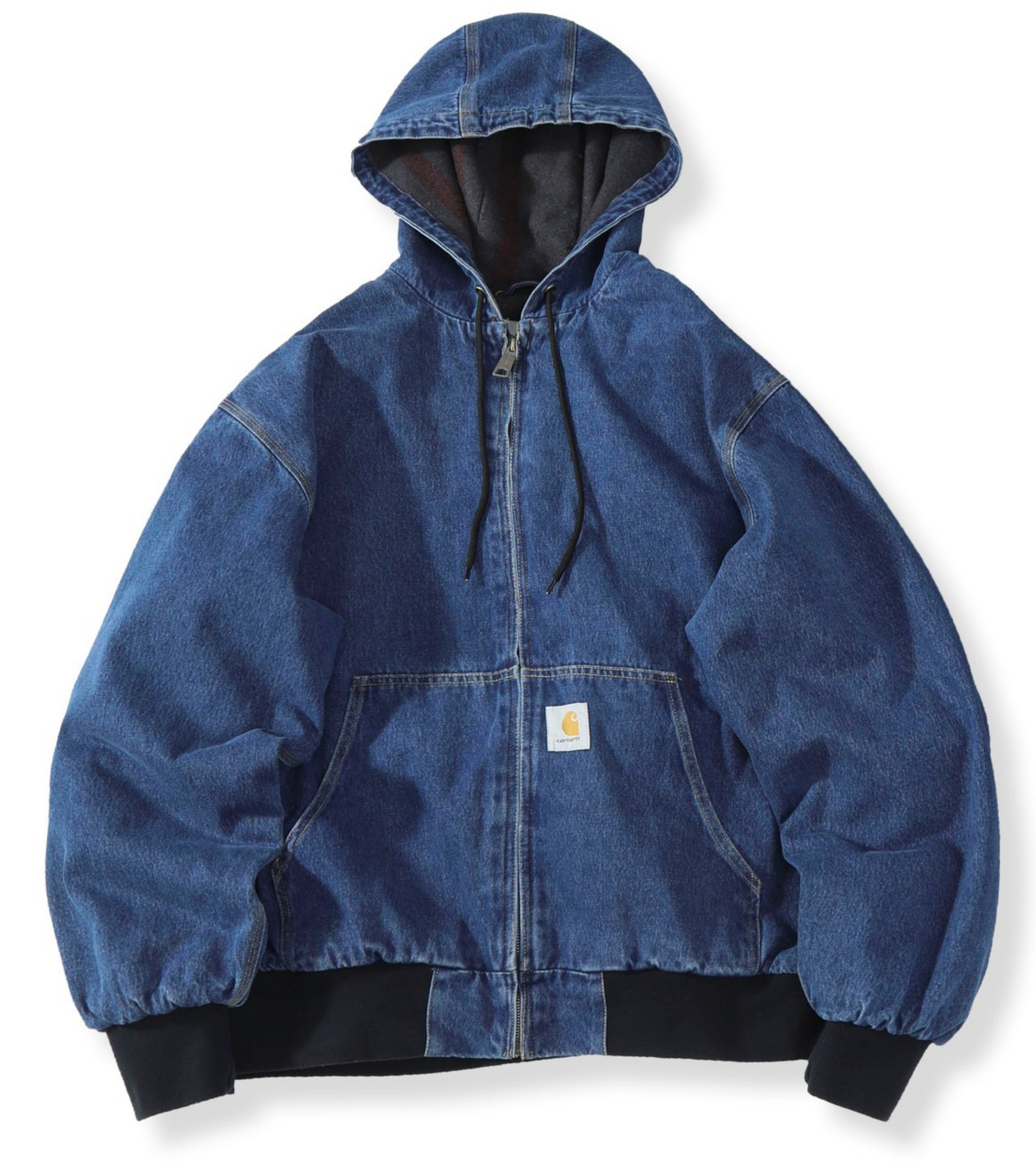 A blue denim Carhartt hooded jacket with black ribbed cuffs and hem, displayed flat against a white background.