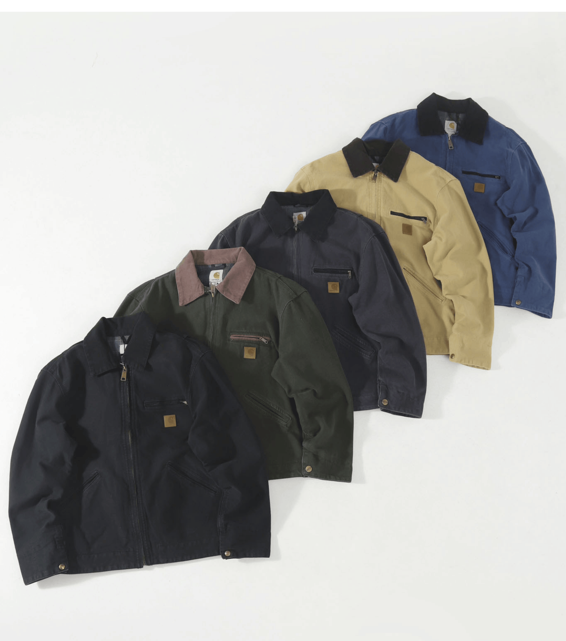Four Carhartt waxed canvas work jackets in black, olive green, navy blue, and tan, arranged in a diagonal row on a white background.